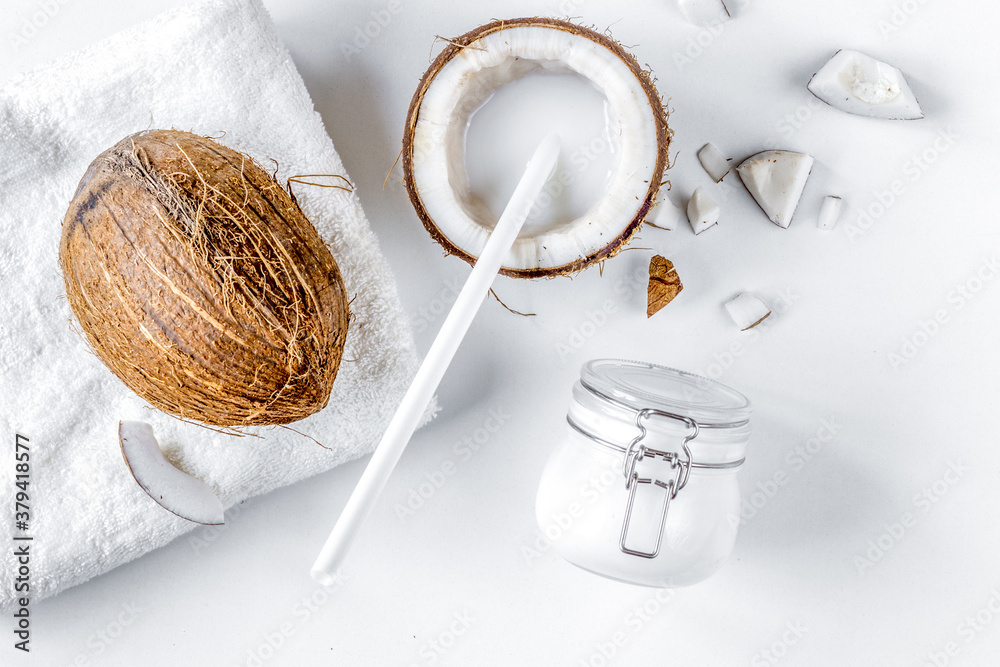 organic cosmetics with coconut on white background top view