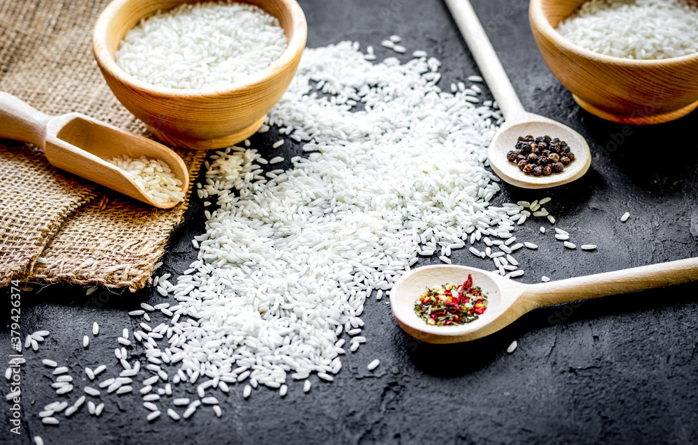 ingredients for paella on dark background