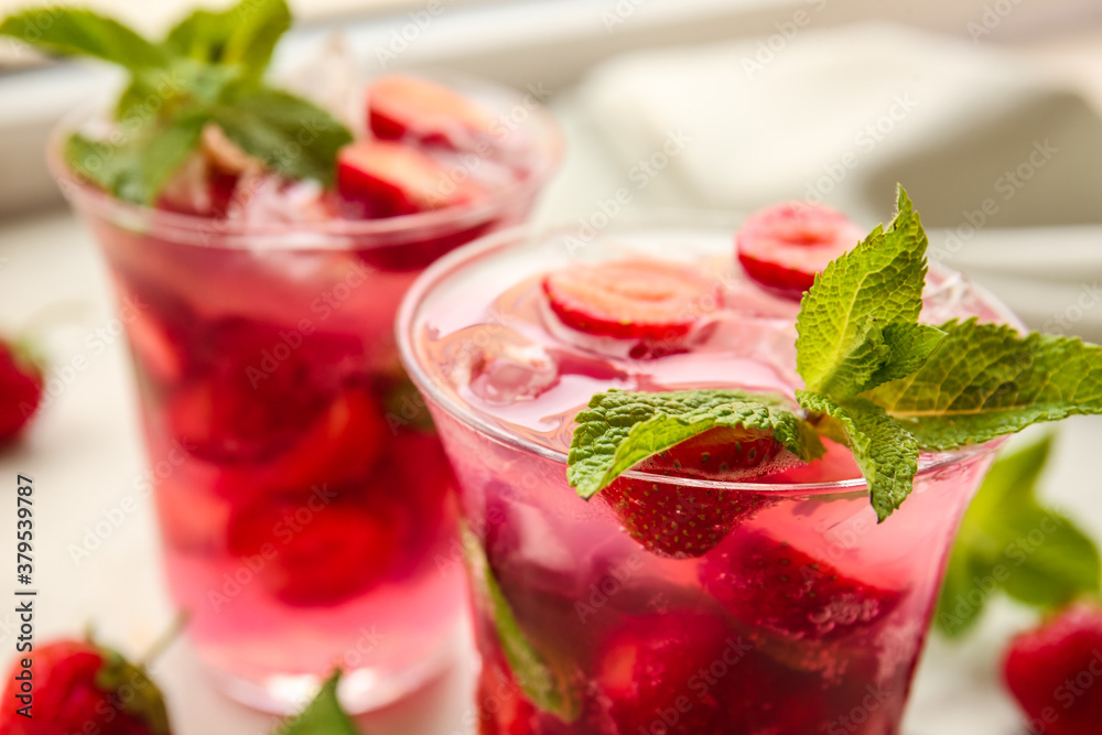 Glass of fresh strawberry mojito, closeup