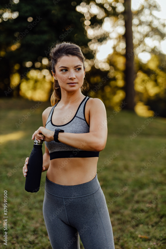 Wearing sports outfit.