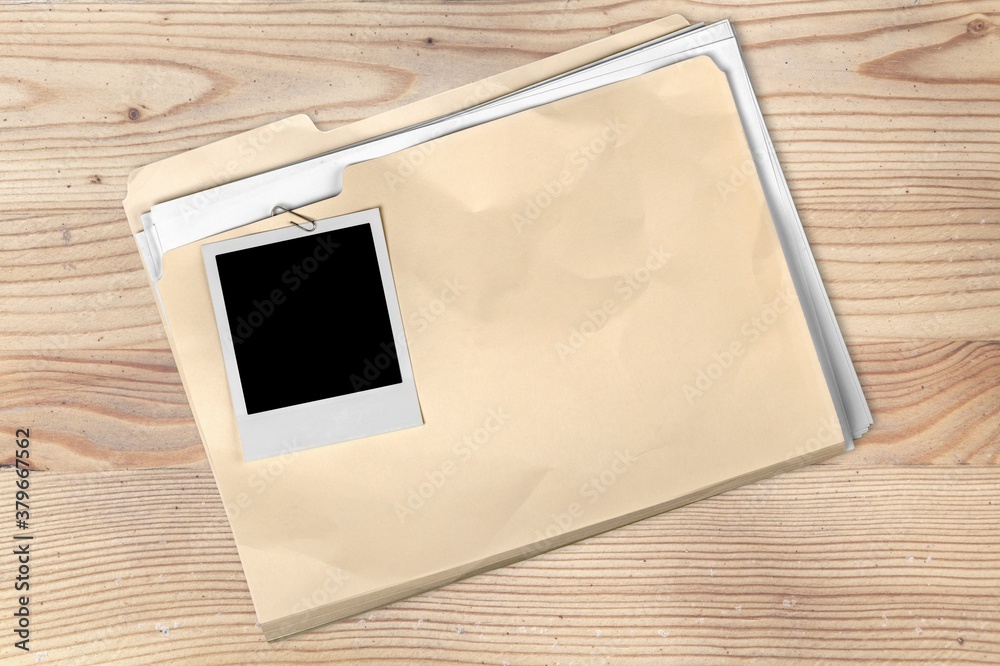 File folder with documents and blank install photo frame