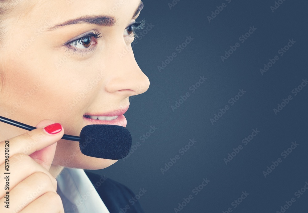 Woman call center operator on blur background