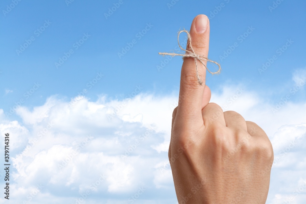 Rope bow on finger pointing up