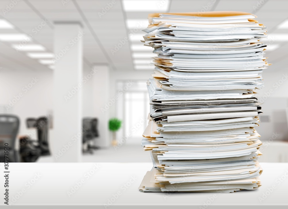 Stack of document papers on office background