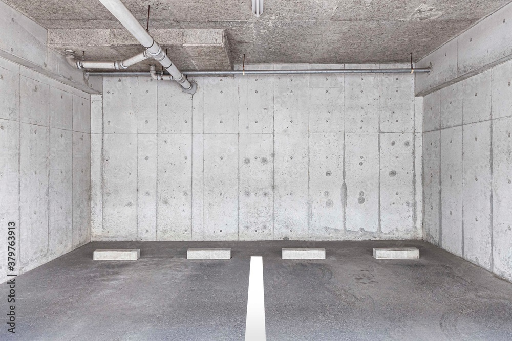 Empty small Parking on the ground floor below the apartment building