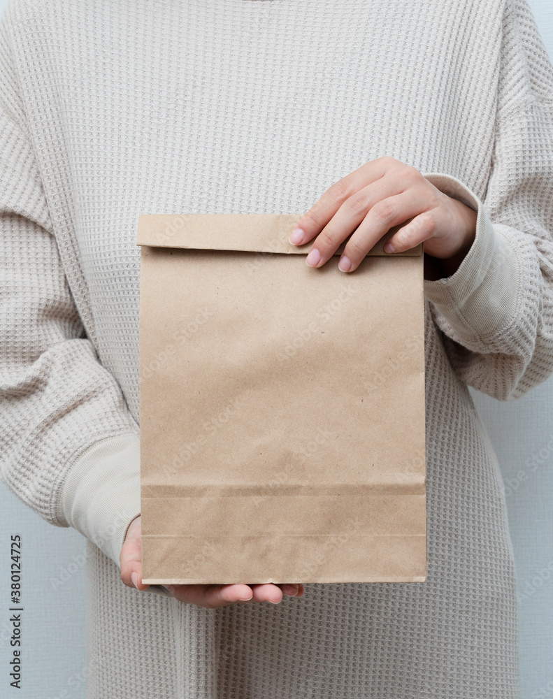 Woman with a paper bag