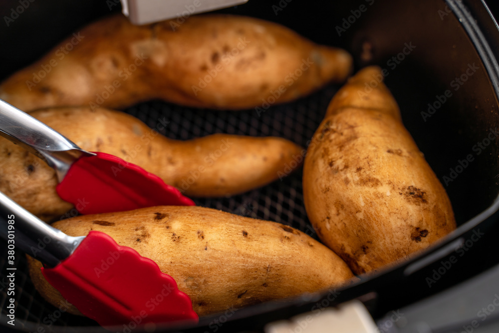 Roasted sweet potato cooked by airfryer at home. Healthy food for diet eating.