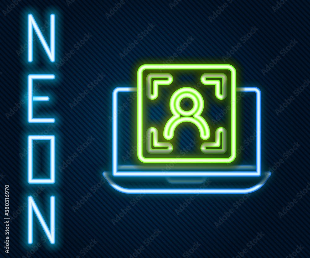 Glowing neon line Laptop with face recognition icon isolated on black background. Face identificatio