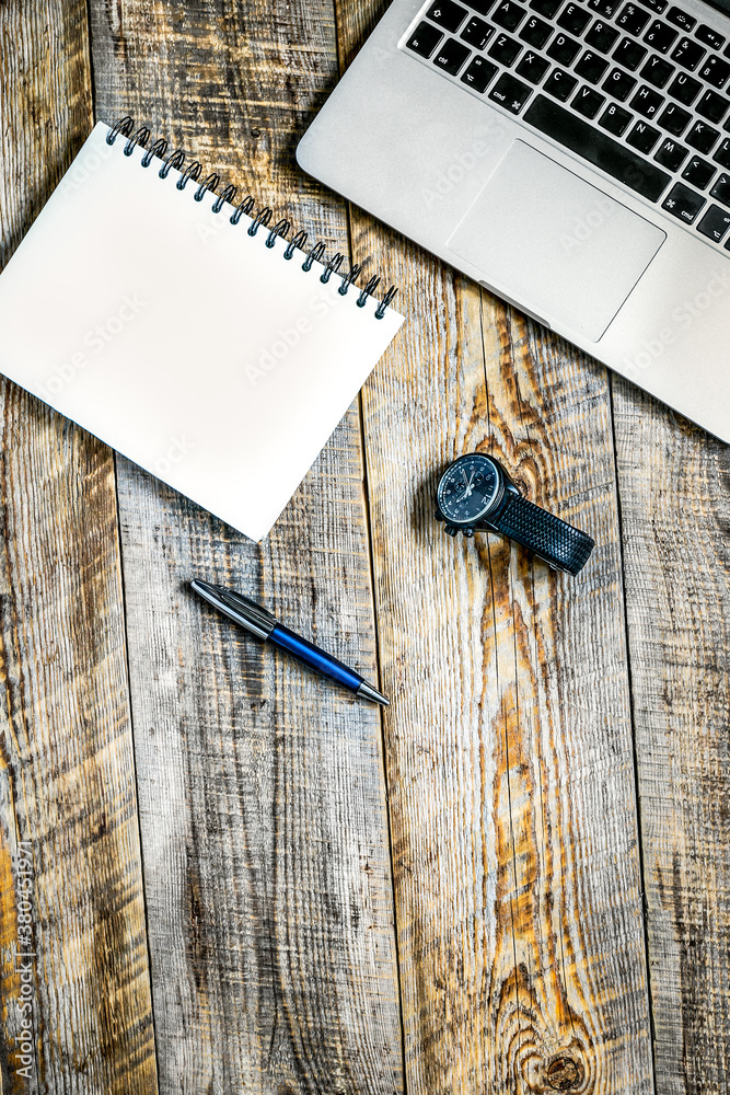 Comfortable sunny working place on wooden table