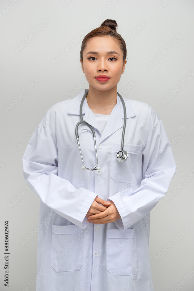 Healthcare and medicine concept - smiling female doctor