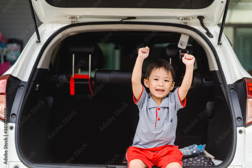 Back to School Concept.Happy Funny little asian boy raising hands thumb up and very excited and glad