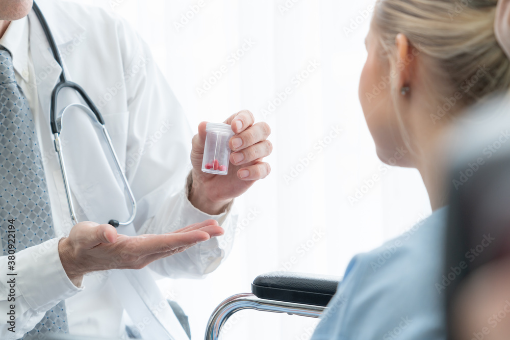 Doctor in professional uniform examining patient at hospital or medical clinic. Health care , medica