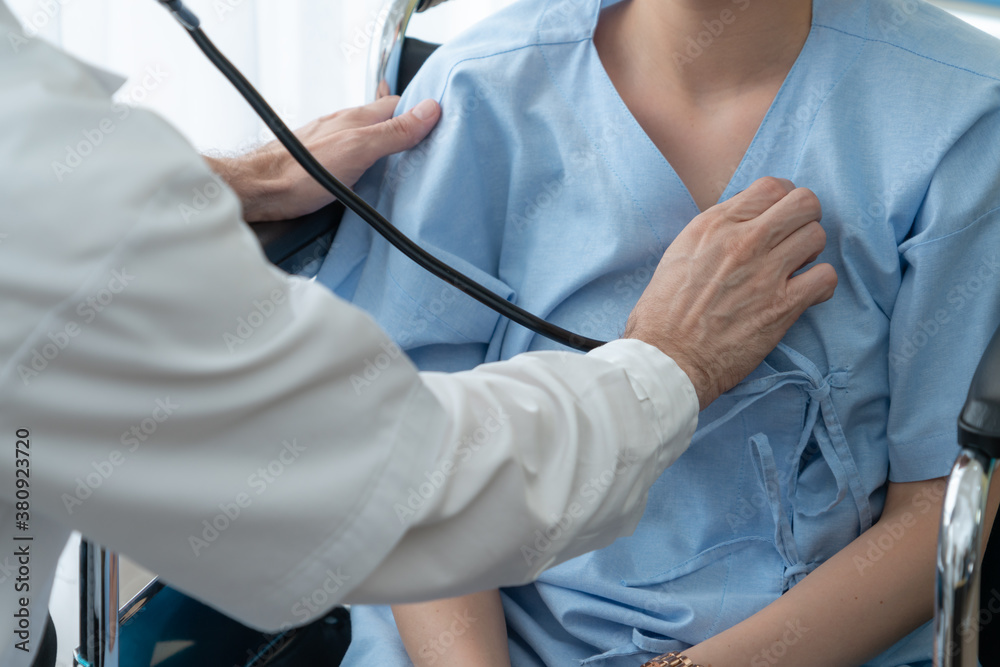 Doctor in professional uniform examining patient at hospital or medical clinic. Health care , medica