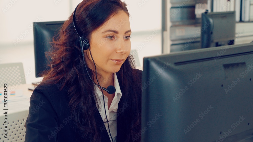 Business people wearing headset working in office to support remote customer or colleague. Call cent