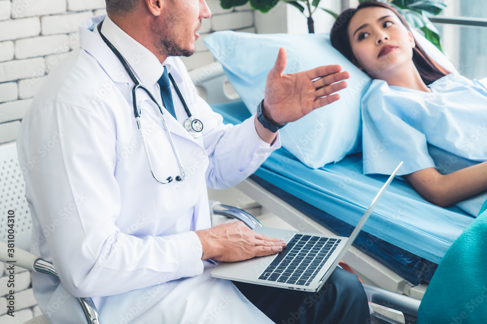 Doctor in professional uniform examining patient at hospital or medical clinic. Health care , medica