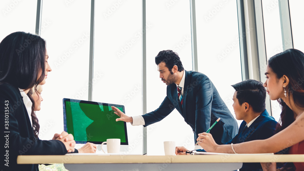 Business people in the conference room with green screen chroma key TV or computer on the office tab