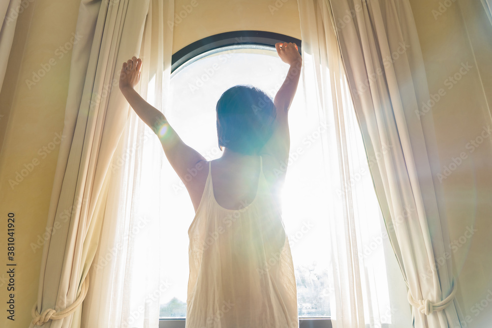 Asian beautiful woman with short hair wakes up early morning