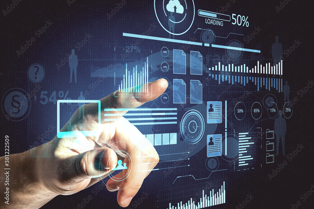 Hand using virtual screen with business charts