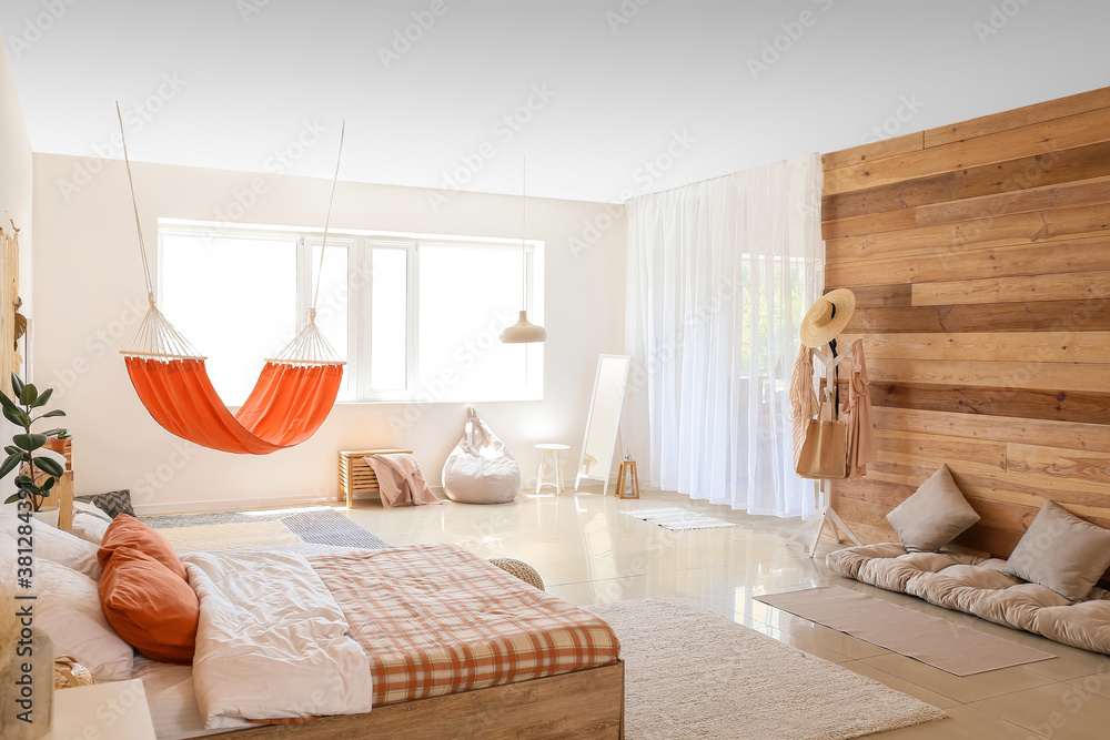 Interior of living bedroom with stylish hammock