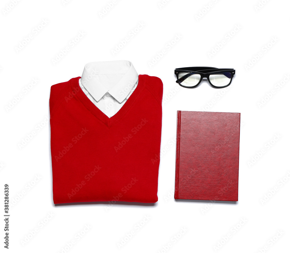 Stylish school uniform with book on white background