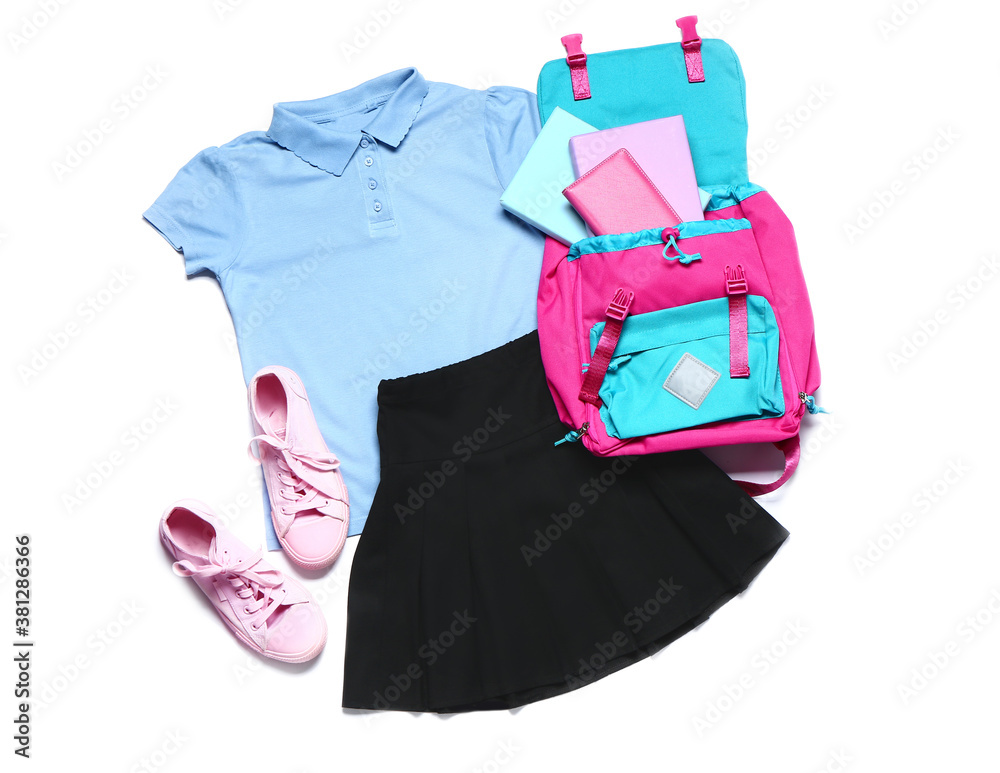 Stylish school uniform with backpack on white background