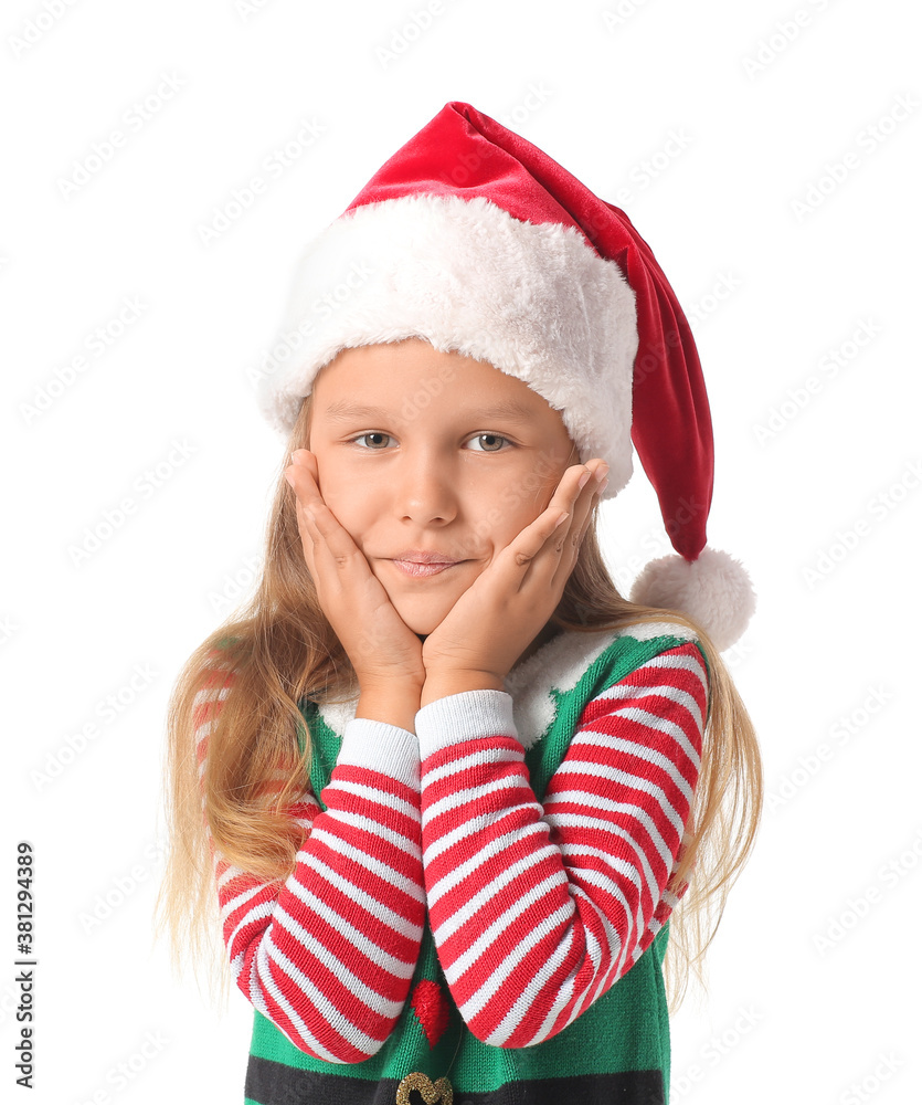 Cute little girl dressed as elf on white background