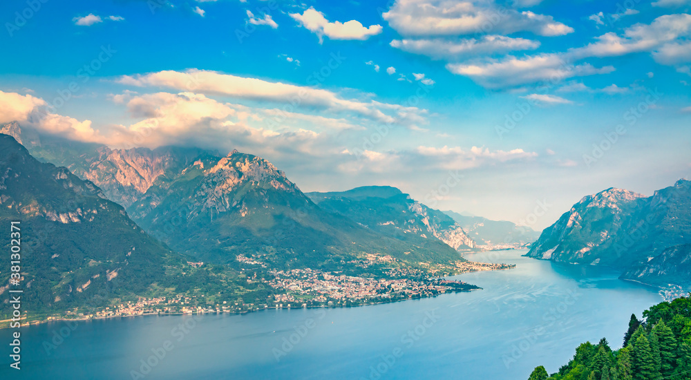 Como Lake landscape. Lake, alps and village view, Italy