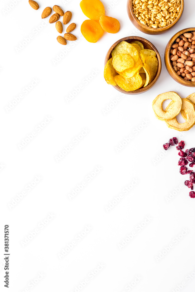 Mix of nuts and dried fruits top view with copy space