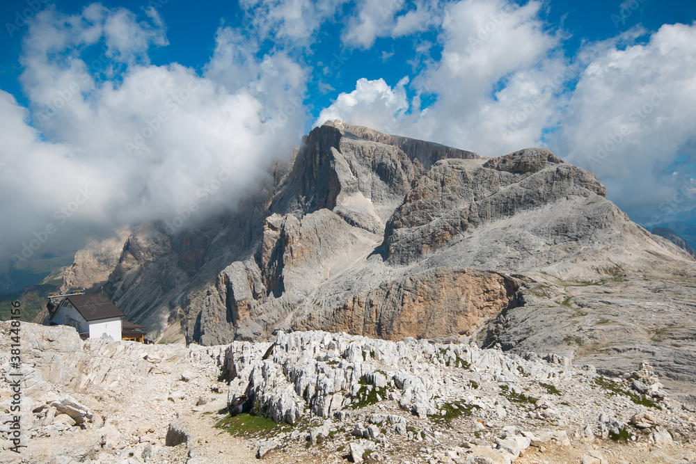 View of Pale di San Martino plateau, Mt Rosetta, 2743 m, with the cable car station of San Martino d