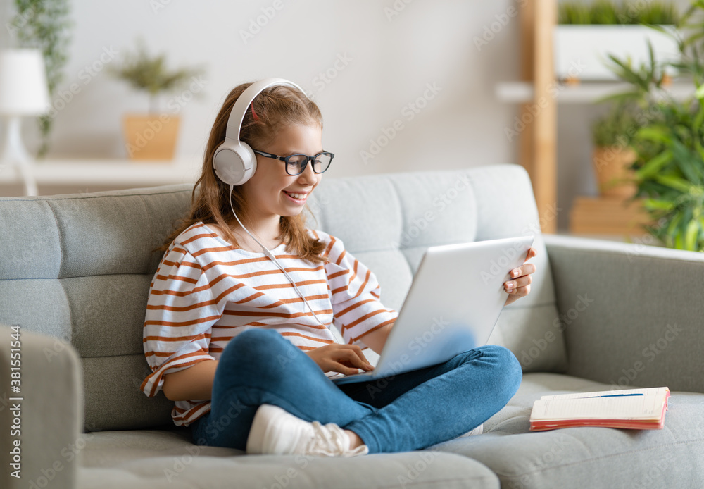 Girl doing homework or online education.