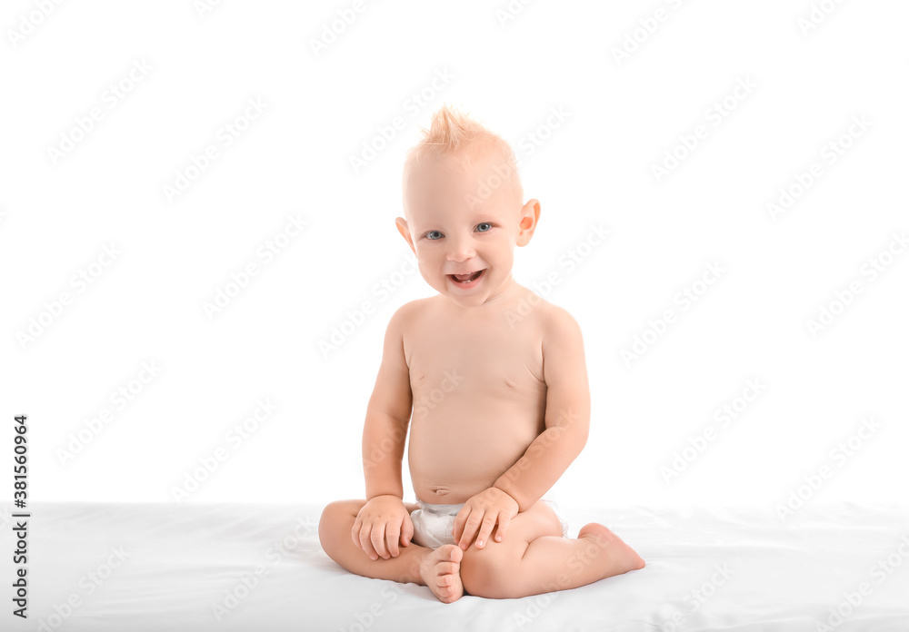 Portrait of cute little baby on white background