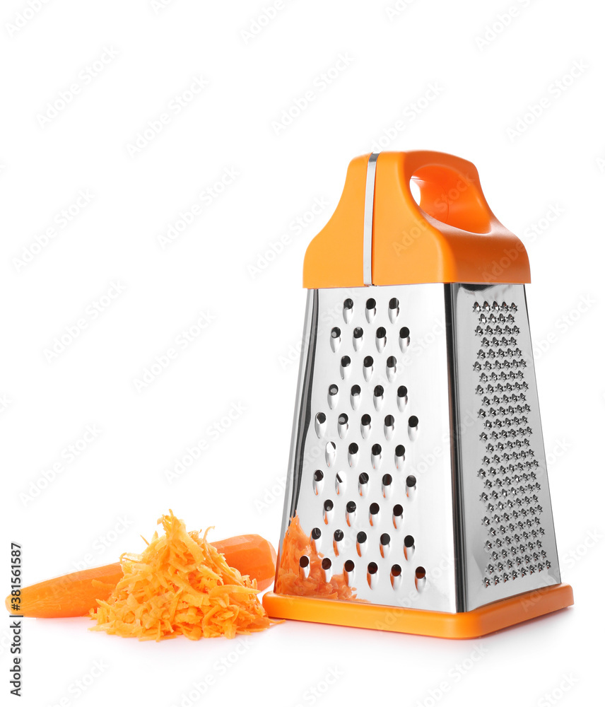 Metal grater and carrot on white background