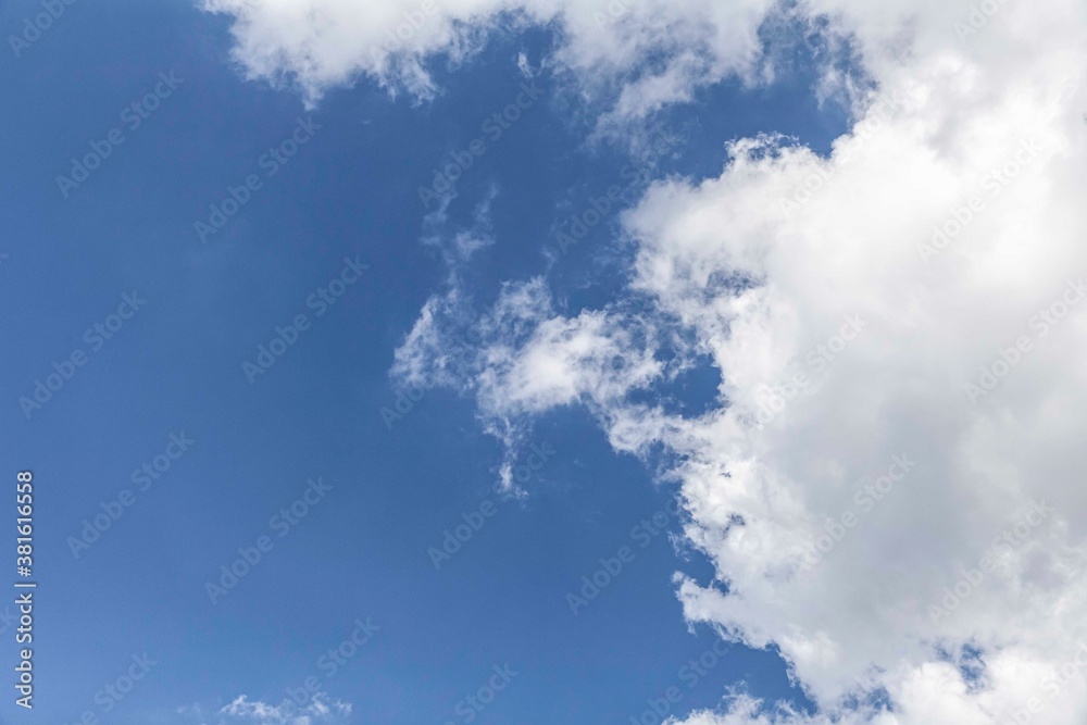 The vast blue sky, clouds sky. Blue sky background with tiny clouds. Sky panorama background