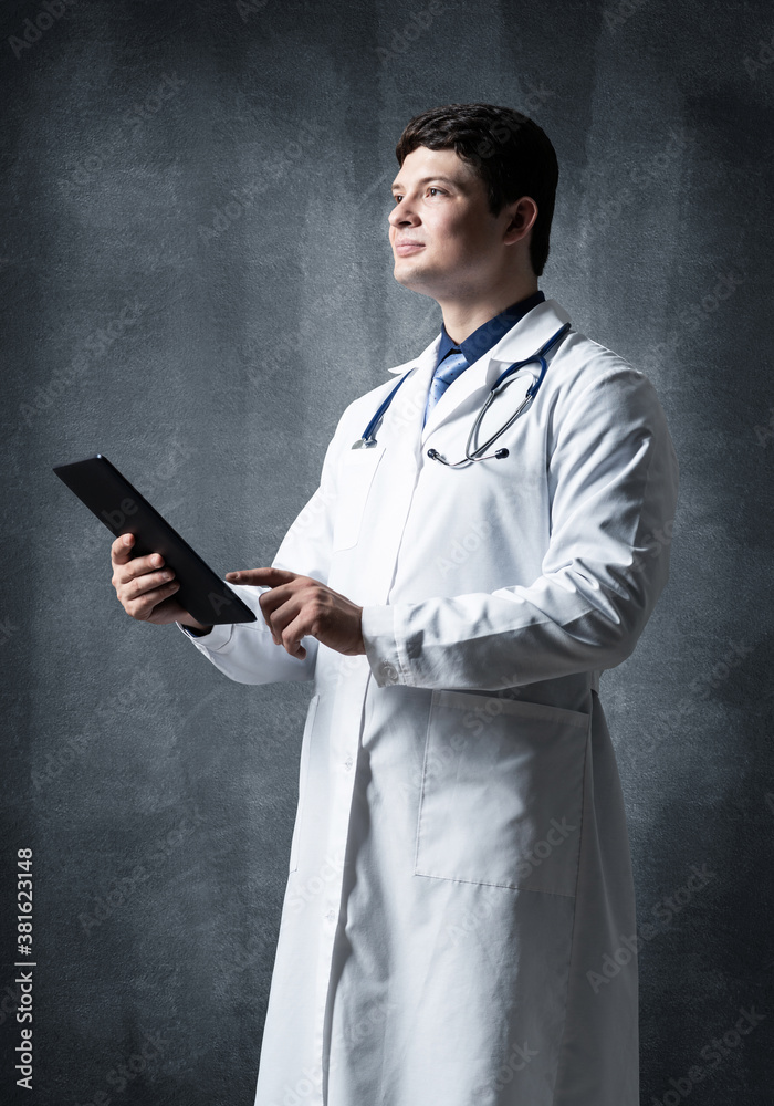 Doctor with a computer tablet