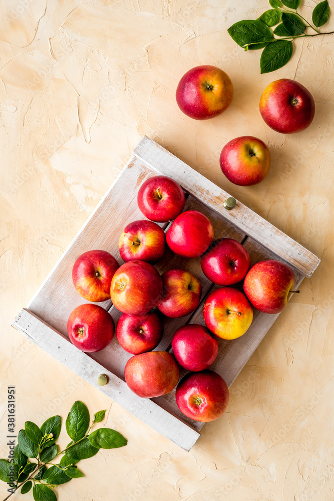 Apples background on kitchen desk - top view