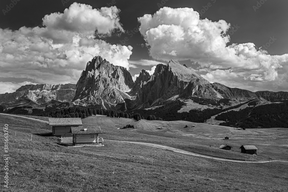 Famous Alpe di Siusi - Seiser Alm with Sassolungo - Langkofel mountain group in background at sunset