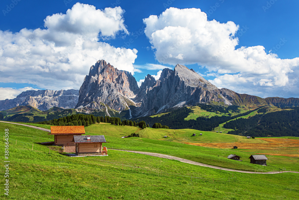 Famous Alpe di Siusi - Seiser Alm with Sassolungo - Langkofel mountain group in background at sunset