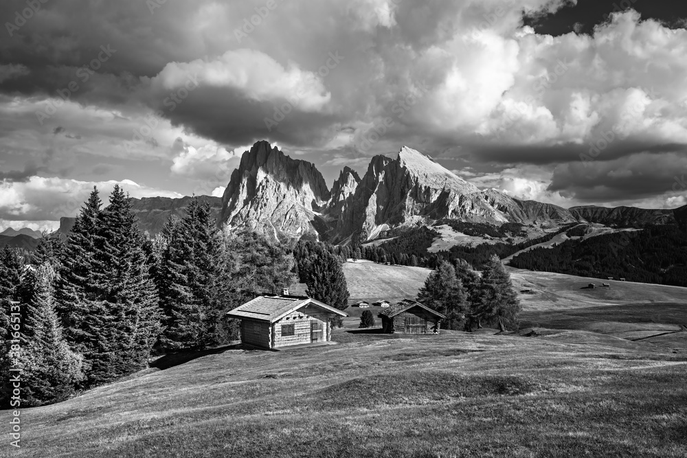 Famous Alpe di Siusi - Seiser Alm with Sassolungo - Langkofel mountain group in background at sunset