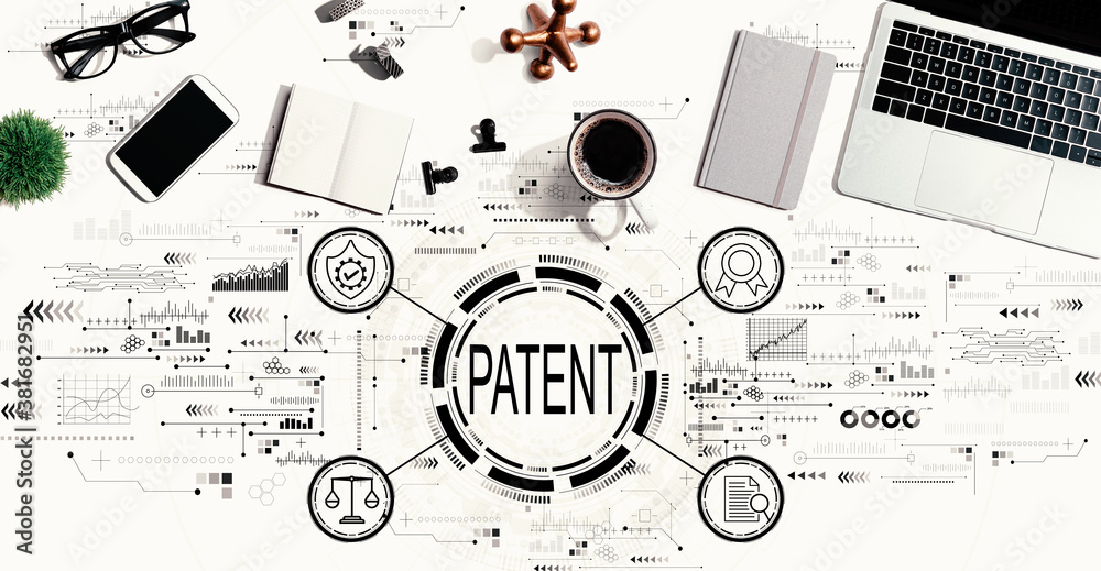 Patent concept with a laptop computer on a desk