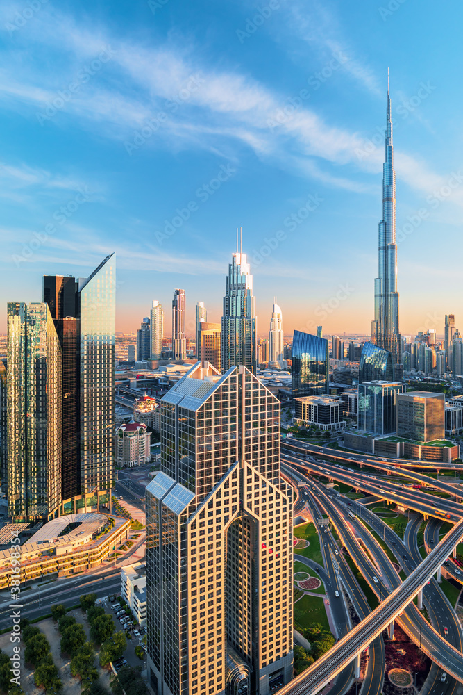 Dubai - amazing city skyline with luxury skyscrapers at sunset, United Arab Emirates