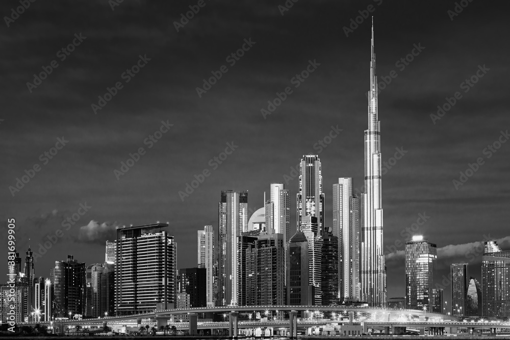 Dubai skyline with reflection in the river at sunrise , Dubai, United Arab Emirates 