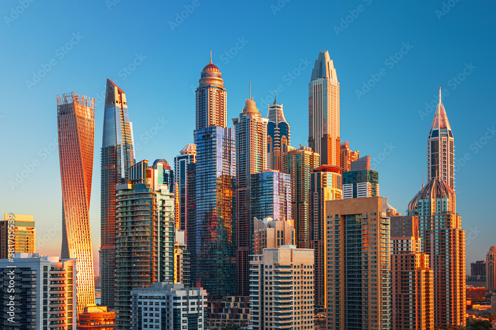 Modern and Luxury Dubai Marina - famous Jumeirah beach at sunrise, United Arab Emirates