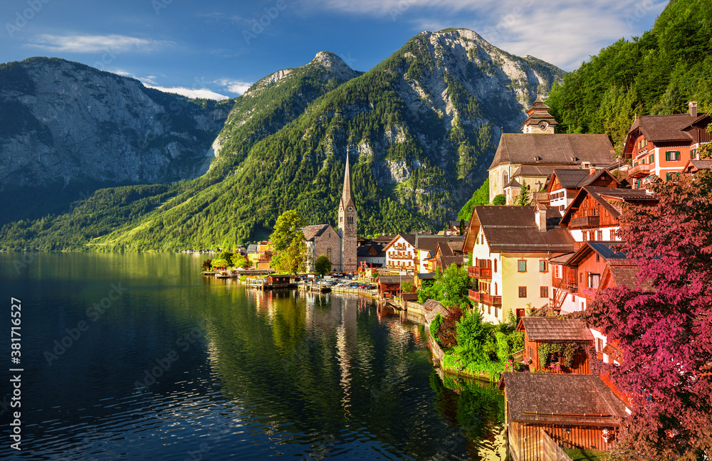 Scenic picture-postcard view of famous Hallstatt mountain village in the Austrian Alps at beautiful 