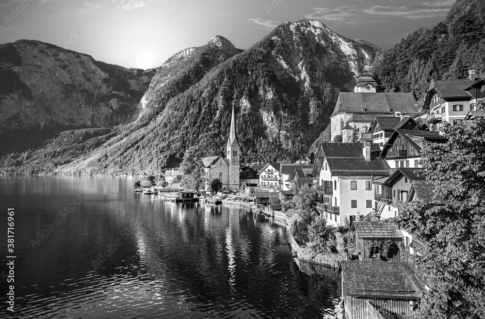 Scenic picture-postcard view of famous Hallstatt mountain village in the Austrian Alps at beautiful 