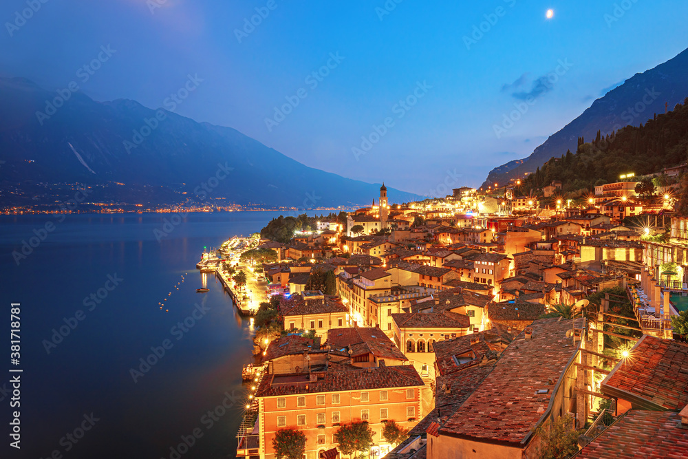 Scenic view on Lake Garda  in Limone sul Garda town, famous tourist destination in Italy