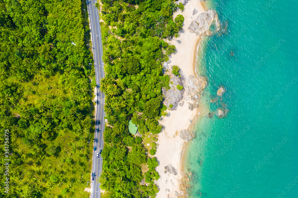 High angle view of  road pass through coconut tree forest and beautiful coastline in Khanom, Nakhon 