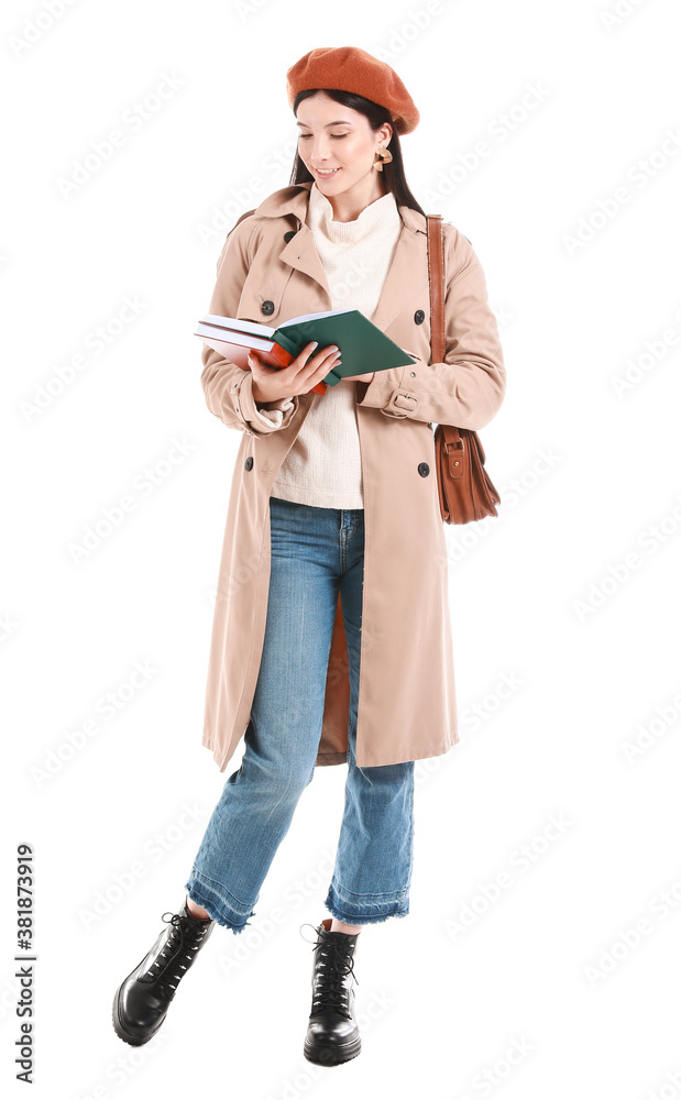 Beautiful young woman with books on white background