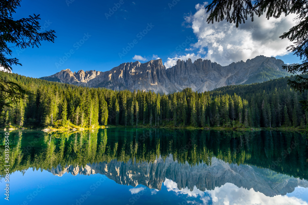 Carezza lake, Mount Latemar, Bolzano province, South tyrol, Italy. Landscape of Lake Carezza or Kare