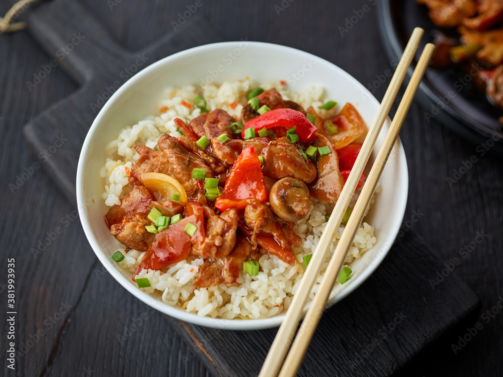 fried rice and vegetables with hot chicken sauce