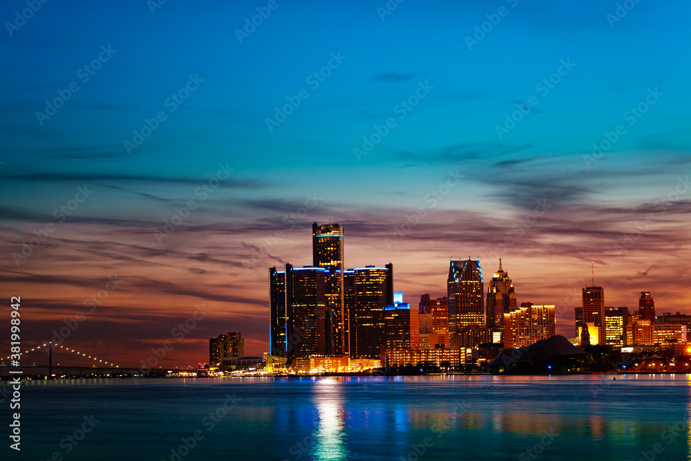 Night view of Detroit river and city downtown from sunset point of Belle Isle, Michigan USA